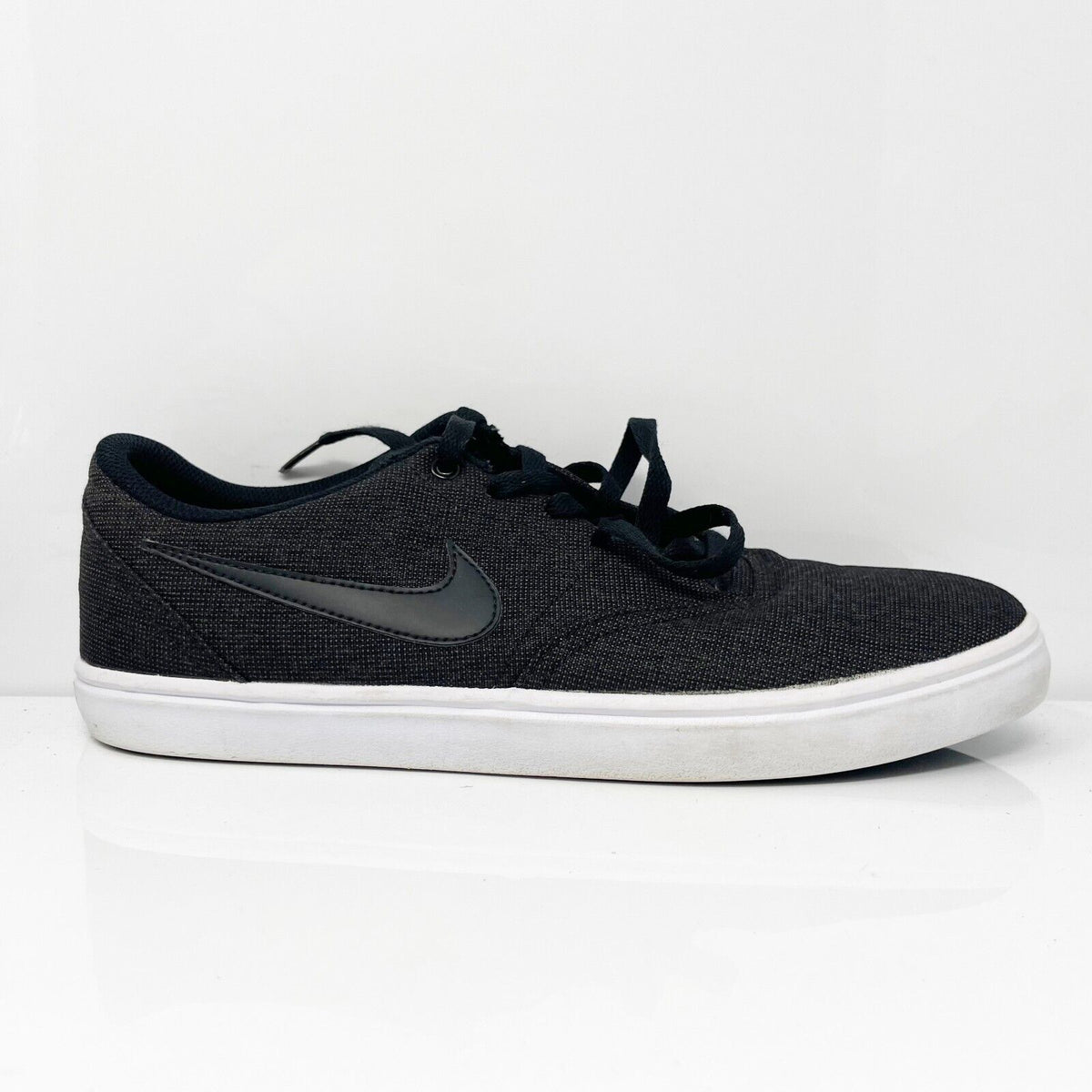 Nike sb black check solarsoft trainers hotsell