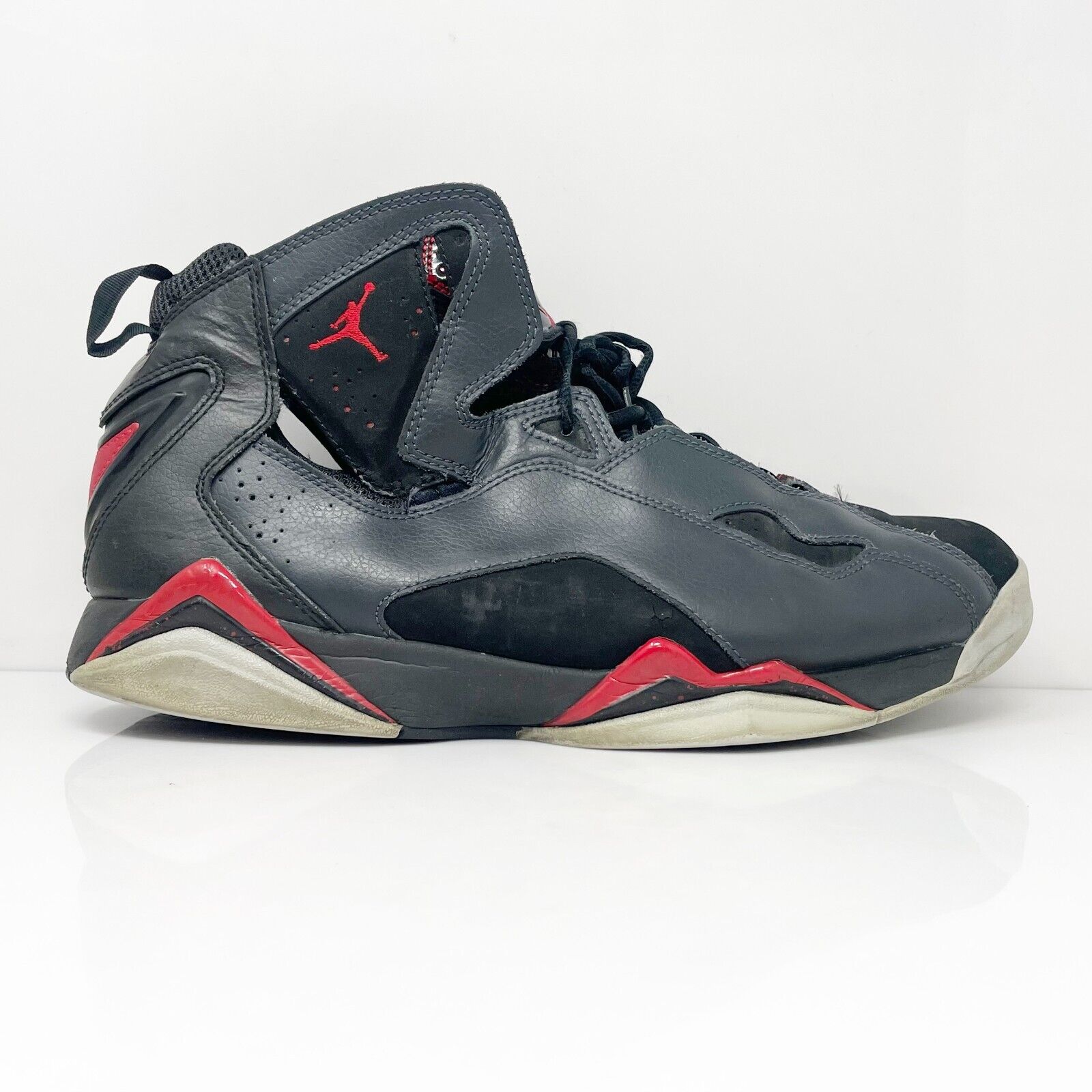 black and red true flight jordans